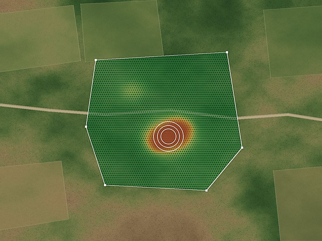 A plantation site with a plant health reading laid over it, showing a failing patch